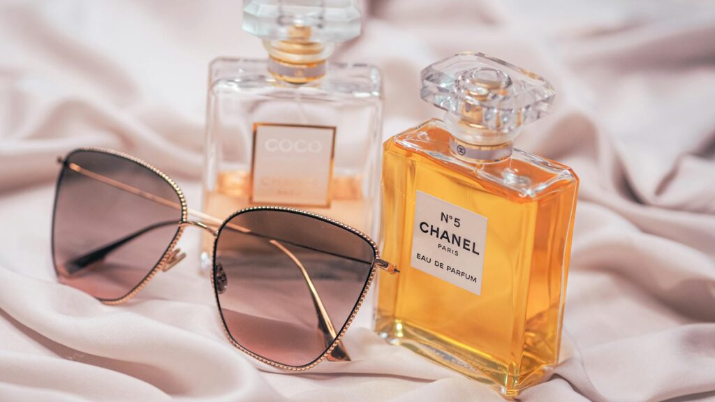 A collection of the best long-lasting perfumes for men in 2026, including luxury and affordable options, displayed on a sleek surface.