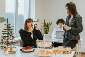 A professional woman in a modern office applying a subtle perfume to her wrist, representing the best office perfumes for women in 2026.