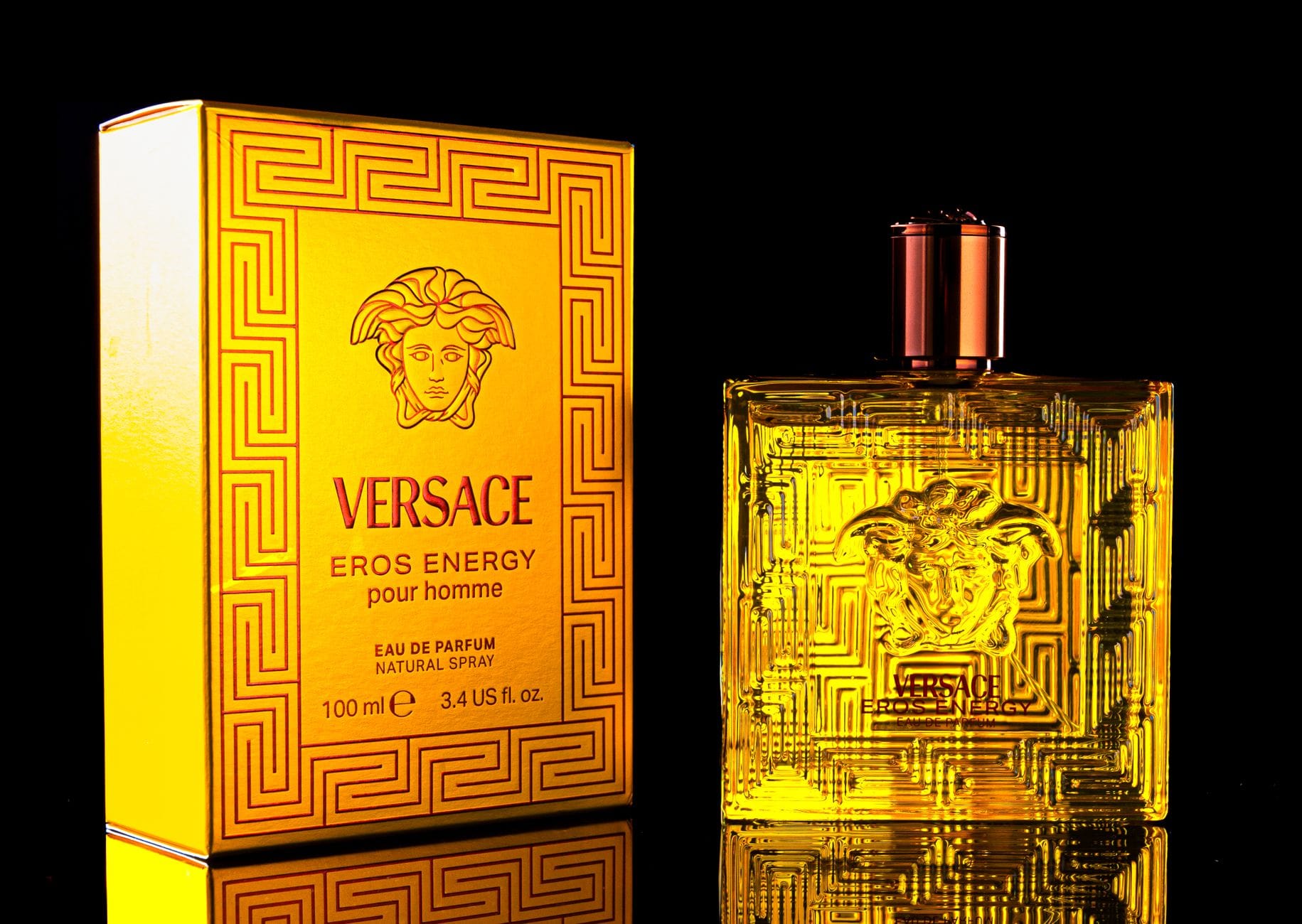 Collection of the best Versace perfumes for men in 2026, including Eros, Dylan Blue, and Oud Noir, displayed in elegant packaging.
