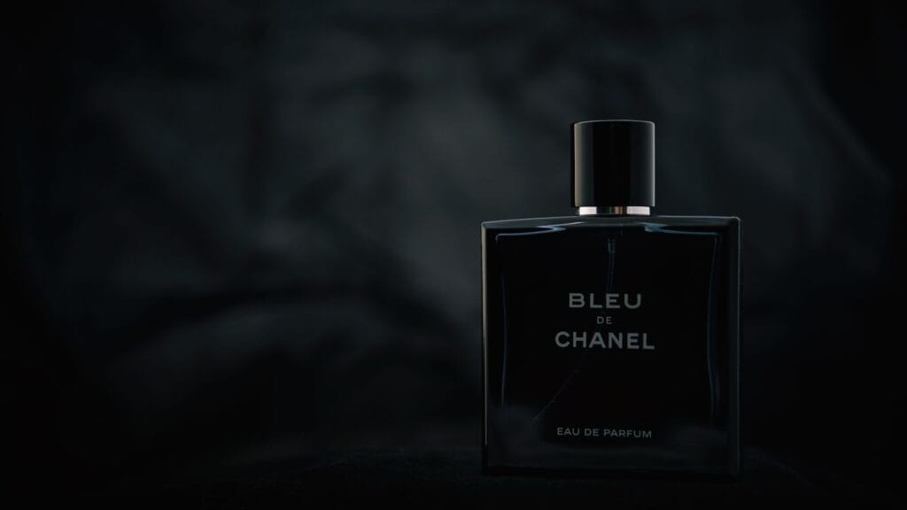 Collection of the best YSL perfumes for men in 2026, including La Nuit de L’Homme, Y EDP, and Kouros, displayed on a modern surface.