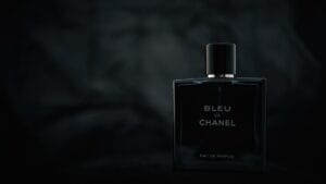 Collection of the best YSL perfumes for men in 2026, including La Nuit de L’Homme, Y EDP, and Kouros, displayed on a modern surface.