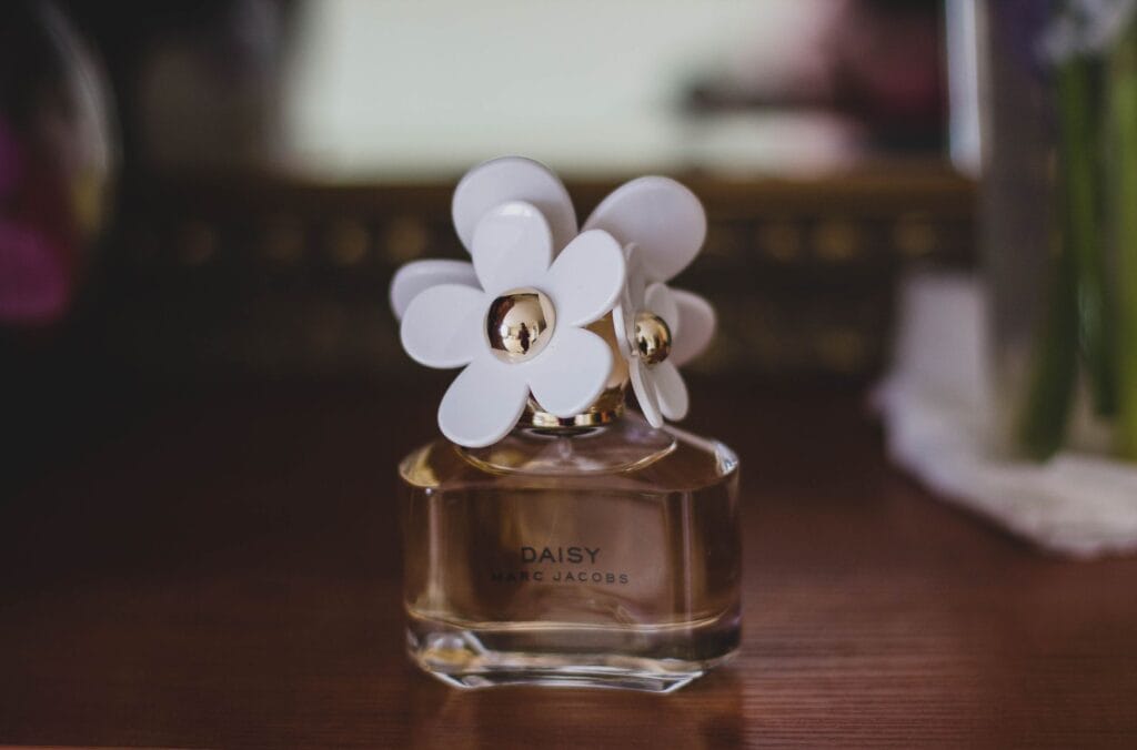 A diverse couple enjoying an evening together, with the man wearing a sophisticated perfume that women love.