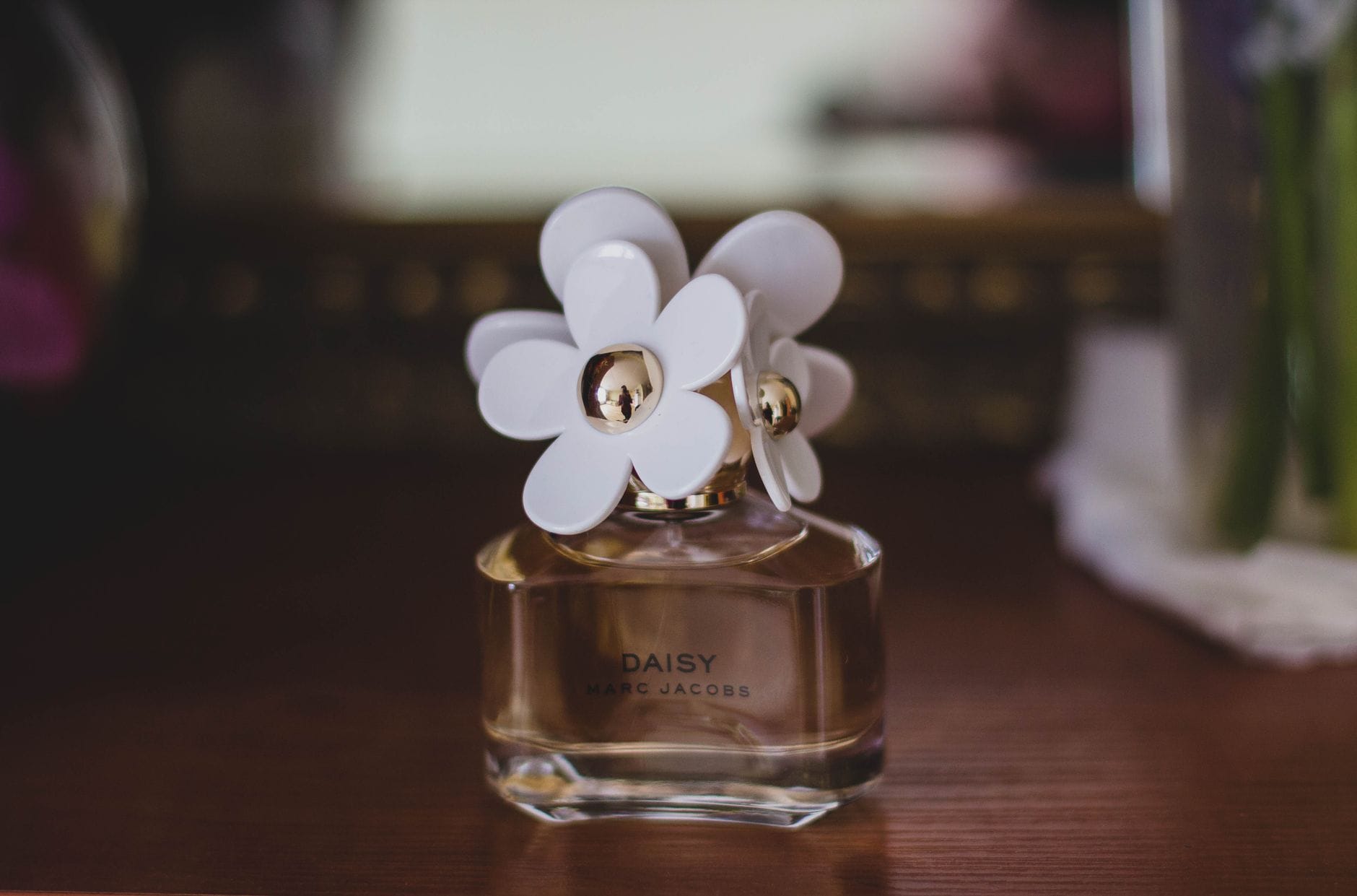 A diverse couple enjoying an evening together, with the man wearing a sophisticated perfume that women love.