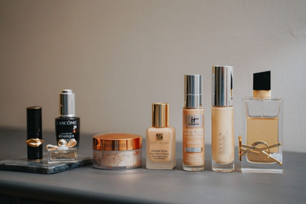 A collection of luxury perfume bottles on an elegant vanity representing regret-free fragrance purchases